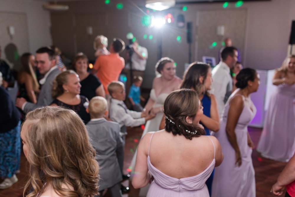 Lake Park Lutheran Church and Holiday Inn Detroit Lakes, Lakeside Wedding by Amber Langerud Photography | Vanessa &amp; Eric