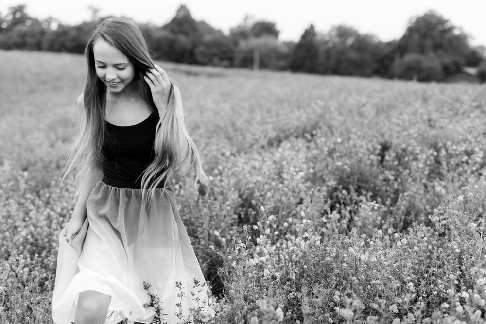 Dance and Country Styled High School Senior Session by Amber Langerud Photography near Audubon in a grassy field | Riley