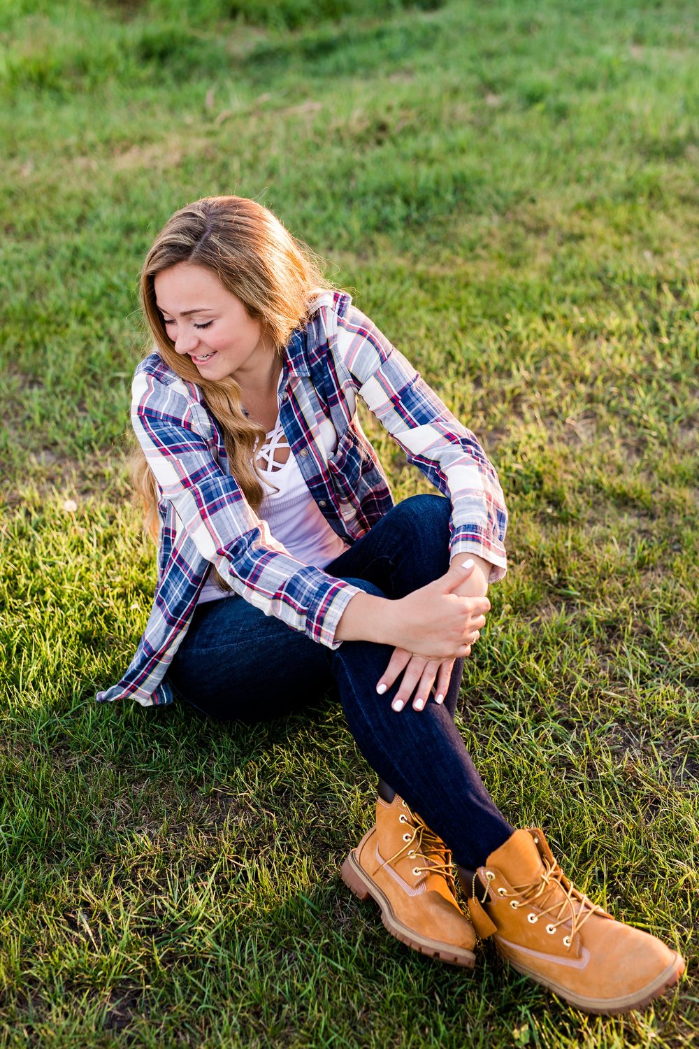 Country Styled High School Senior Pictures on a Farm and Little Cormorant Lake in Minnesota by Amber Langerud with Grass Background
