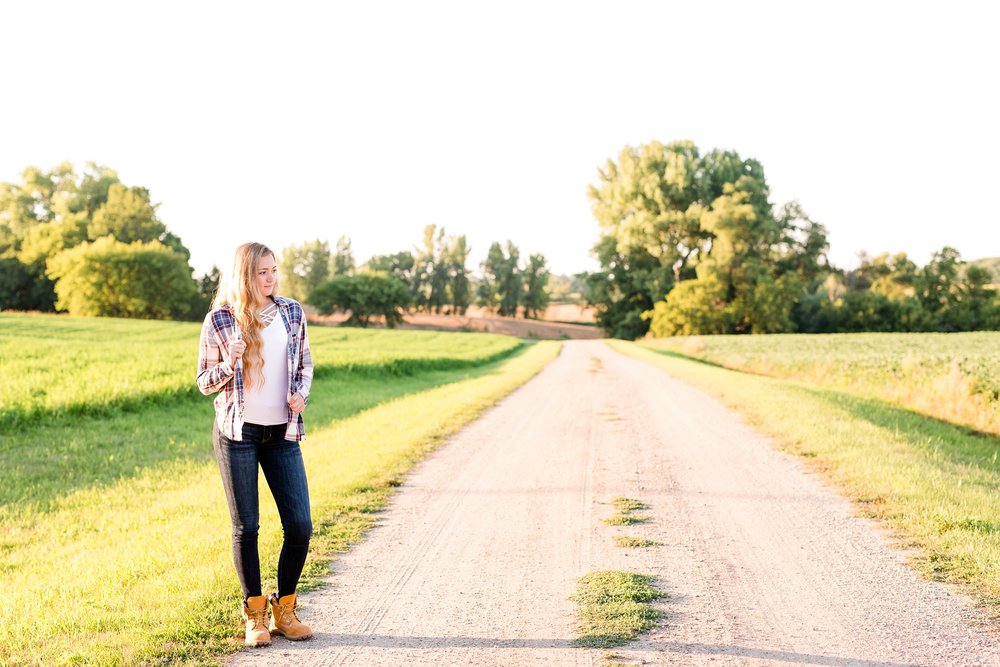 Country Styled High School Senior Pictures on a Farm and Little Cormorant Lake in Minnesota by Amber Langerud with Gravel Road