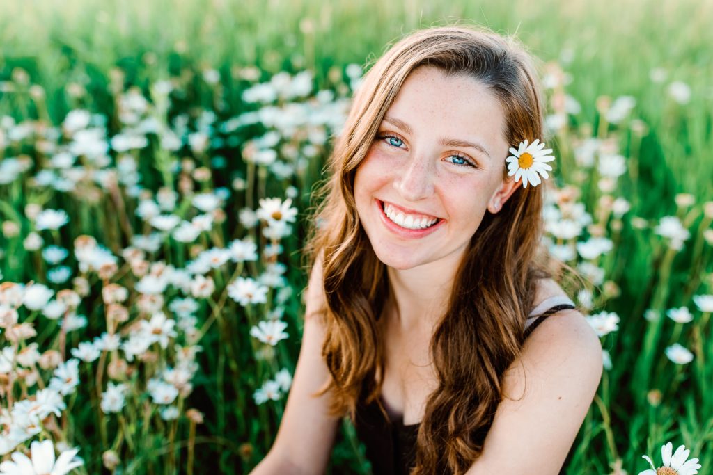 Minnesota High School Senior Portrait of a girl in a field of flowers | Amber Langerud