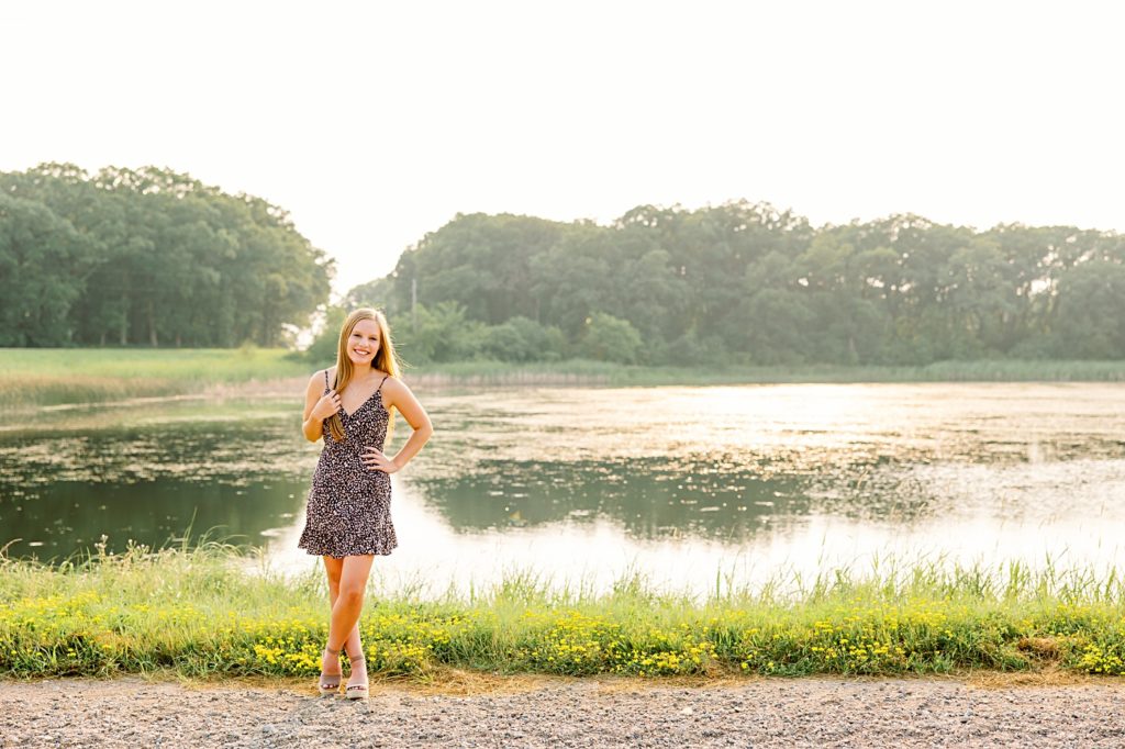 Hawley High School Senior Pictures standing in front of a lake 