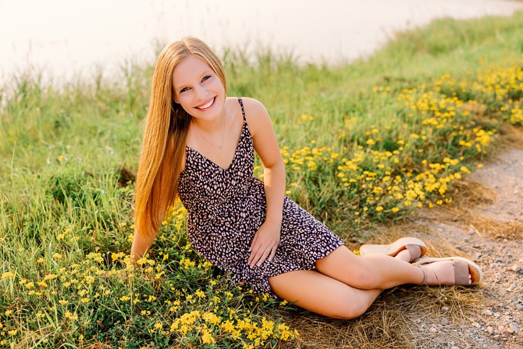 Hawley High School Senior Pictures sitting in yellow flowers