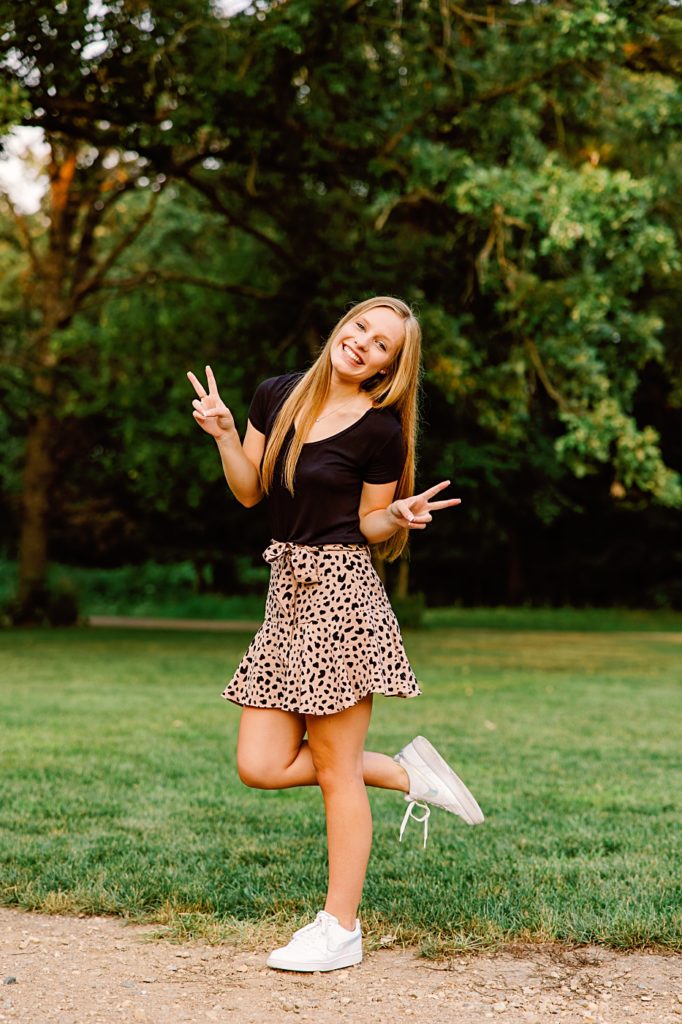 Hawley High School Senior Pictures with a skirt and tennis shoes 