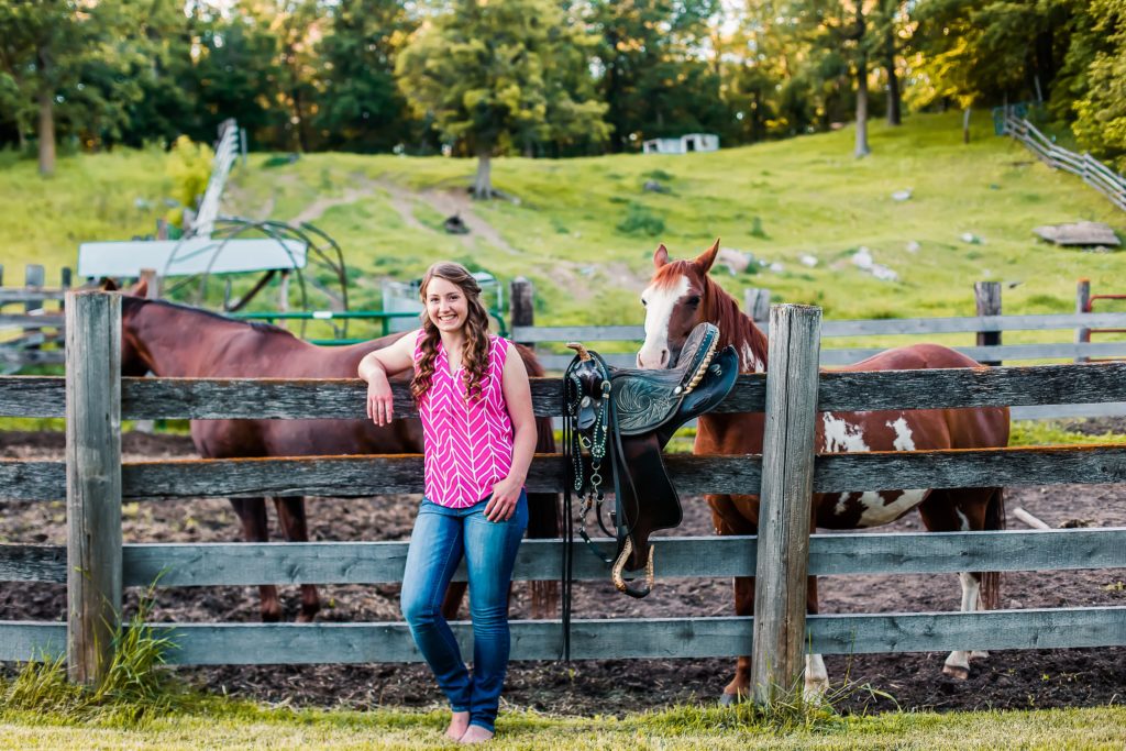 Senior Pictures with the Horses in the background