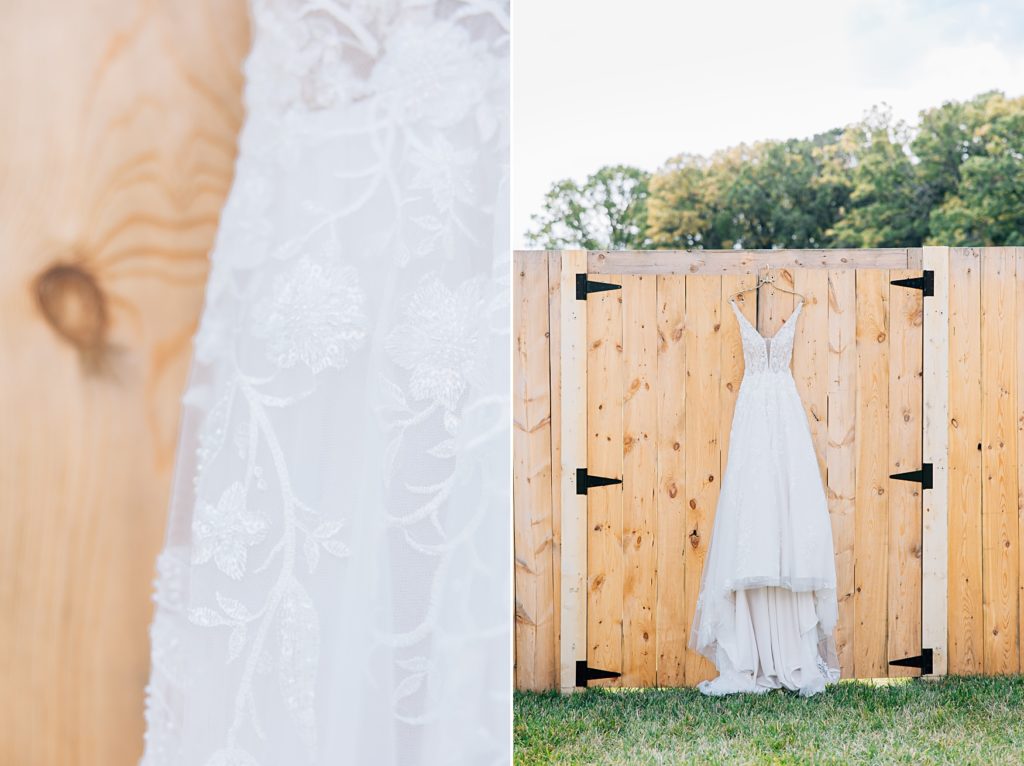 Wedding Dress hanging on rustic barn doors