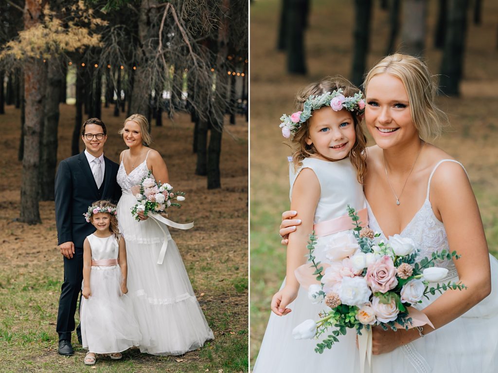flower girl with bride and groom at Willmar, MN Stonewall Farms Wedding