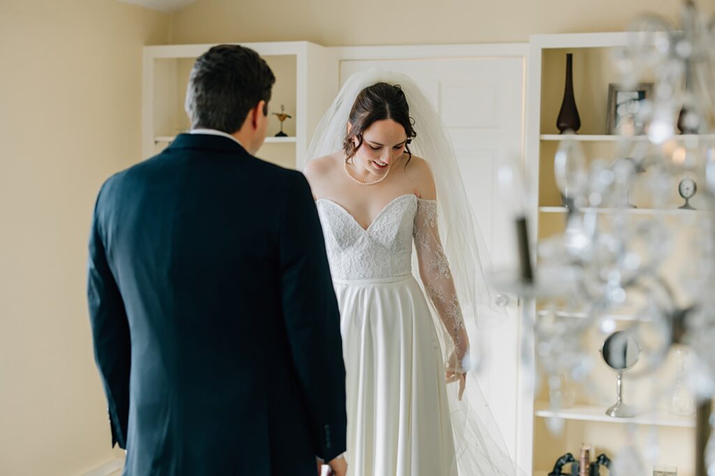 Groom admiring bride at the Lafayette Club in Minnetonka Beach, MN