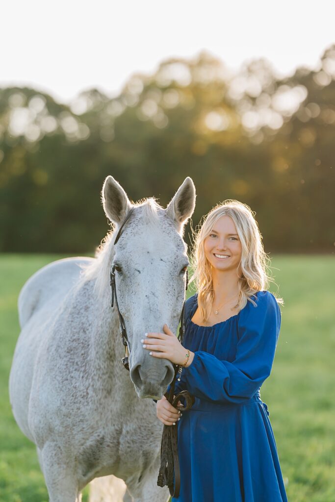 Senior Pictures with Your Horse |  classic portrait variation with senior holding horse
