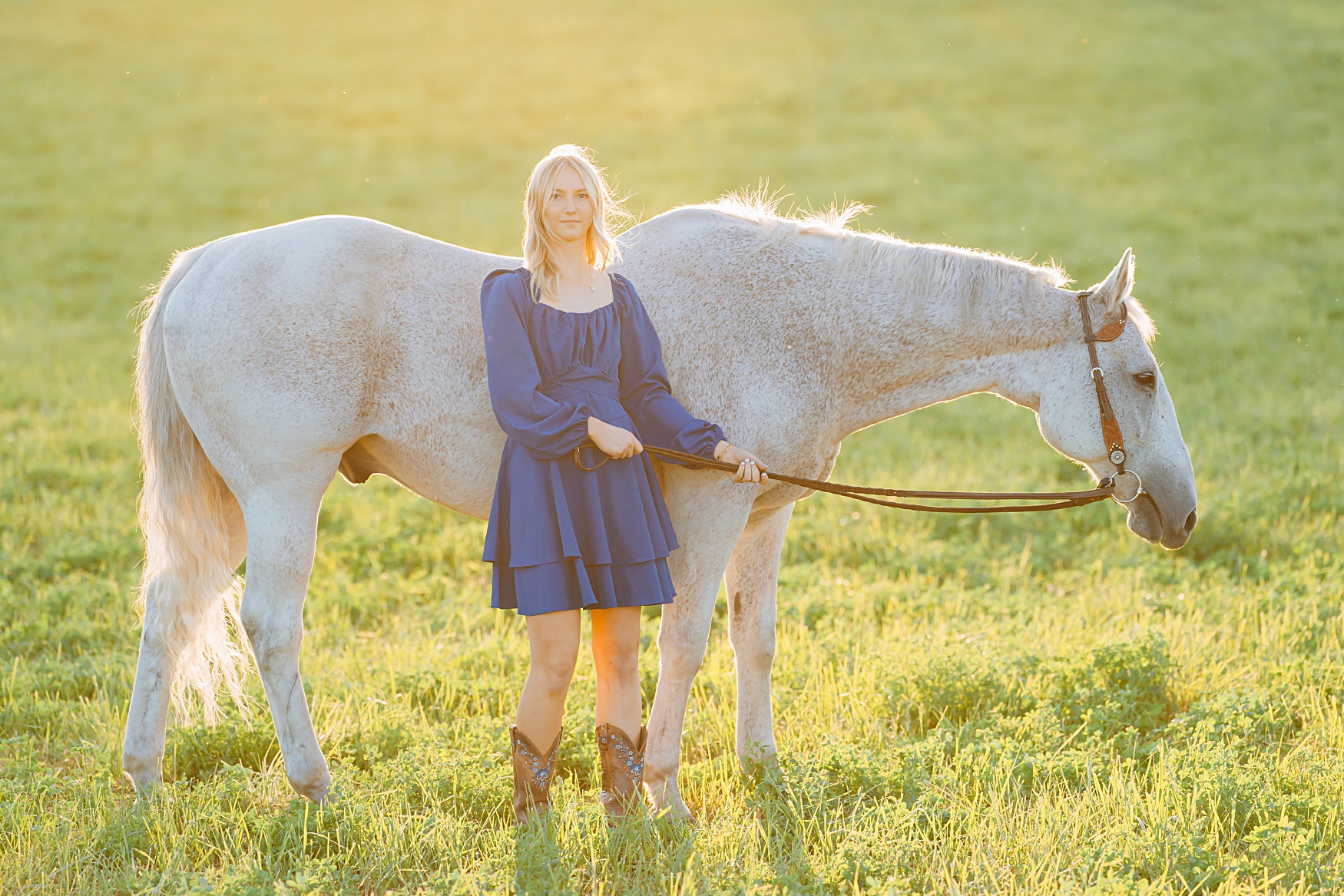 Senior Pictures with Your Horse | Senior standing next to horse, looking at camera