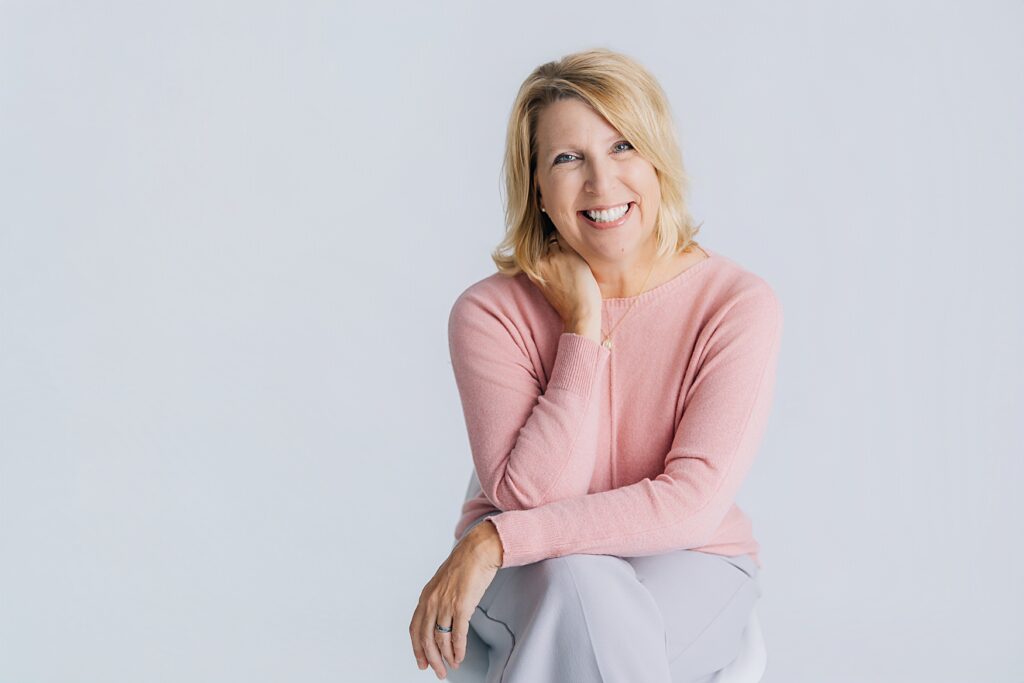 Business owner wearing her relatable outfit to a brand photography session in Minnesota